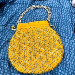 Indian yellow bag with silver sequins